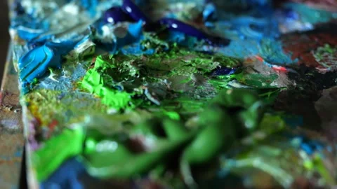 Macro of camera moves over multicolored artist palette Video stock 291441259