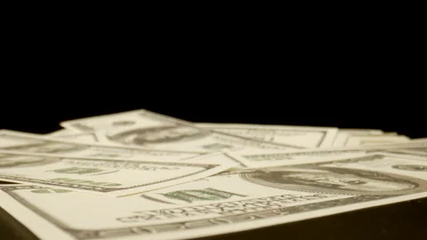 MACRO: Camera moves over of US dollars on the table Видео 181795439