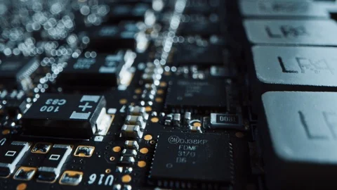 Macro Camera Moving over Printed Circuit Board, showing Computer Motherboard Stock Footage 120929420