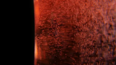 Macro Of Champagne Or Sparkling Red Wine Being Pored Into The Glass Stock Footage 100201465