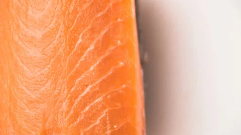Macro Chef Cuts Salmon Fillet Slices For Cooking Sushi Closeup. Video stock 124741617