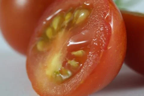Macro cherry tomato Stock Photos