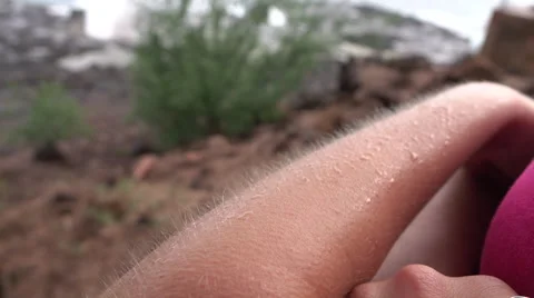 MACRO: Chills on human skin on cold, windy day. Goosebumps on white female arm. Stock Footage 64106403