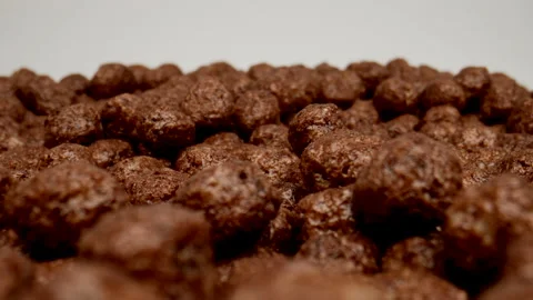 MACRO: Chocolate balls on a white background, Dolly shot Stock Footage 165190366