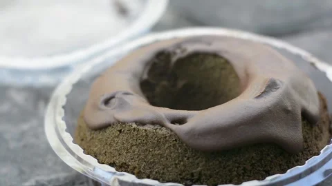 Macro Chocolate Bundt Cake with Rich Glaze Stock Footage 344880524