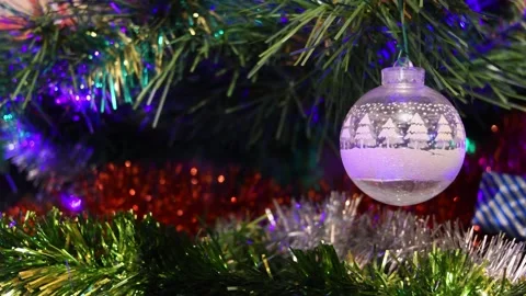 Macro of Christmas Tree Bauble with Colorful Lights Video stock 343254957