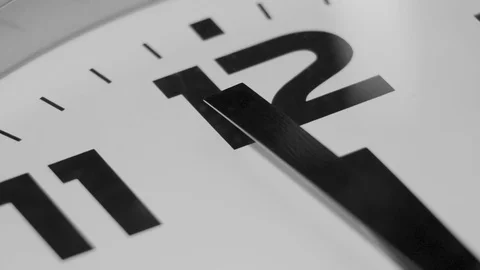 Macro - a clock on the wall close up, the second hand passes 12:00 Stock Footage 103168580