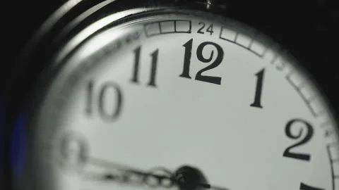Macro close up of the 12 and the second hand of a stopwatch. Stock Footage 342884829