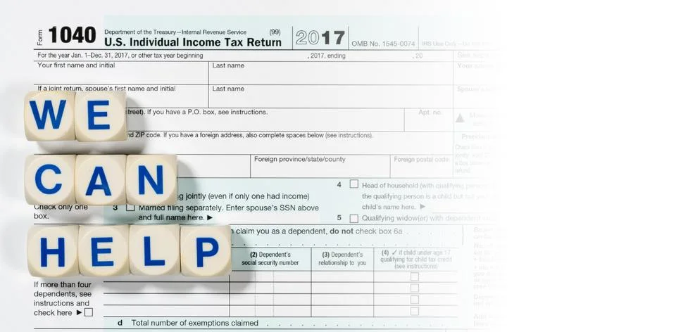 Macro close up of 2017 IRS form 1040 with WE CAN HELP letters Stock Photos