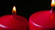Macro Close Up Up 3 Lit Red Candles Rotating Around Black Background Stock Footage