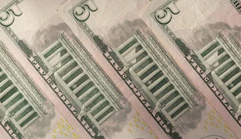 Macro Close-up of 5 US Dollar Bills Featuring the Lincoln Memorial Stock Photos