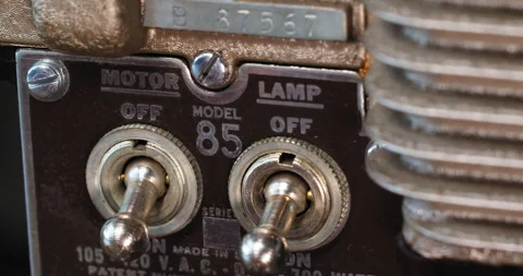 Macro close up of 8mm film strip tape going through an old vintage analog Vídeo Stock 249163508