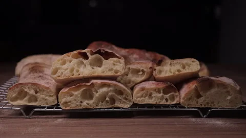 Macro close-up of artisan bread loaf showing crust and crumb texture. Medium Stock Footage 331206520