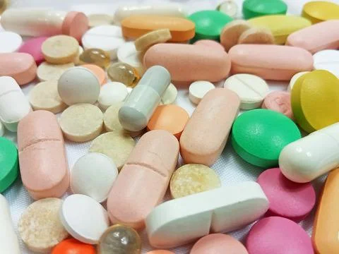 Macro Close-Up of Assorted Colorful Pills and Vitamins Stock Photos