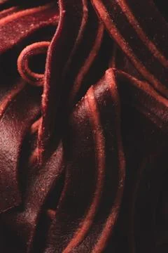 Macro close up of bacon shaped Dog treats snack Stock Photos