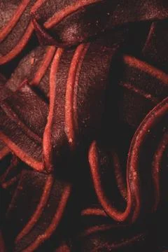 Macro close up of bacon shaped Dog treats snack Stock Photos
