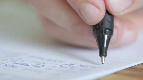Macro close up of a ballpoint pen writing exam essay or letter. Shallow DOF. Stock-Footage 79835458