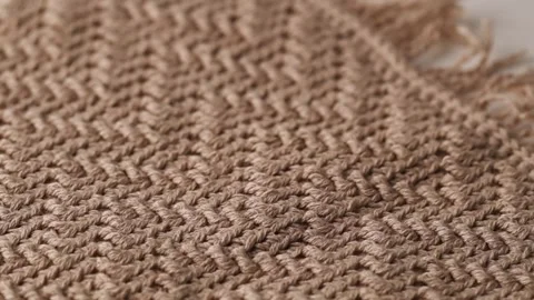Macro Close-up of Beige Crocheted Fabric Texture Stock Footage 345588789
