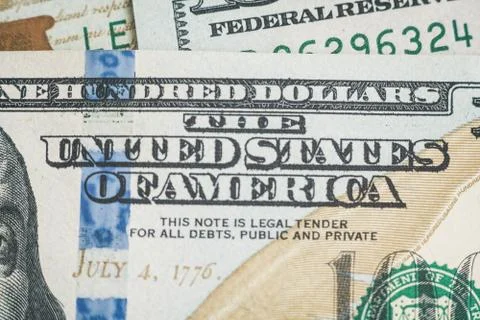 Macro close up of Ben Franklin's face on the US $100 dollar bill. Фото