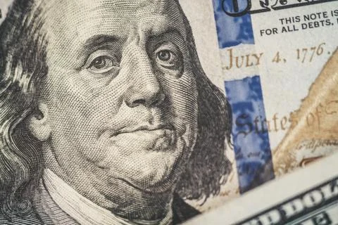 Macro close up of Ben Franklin's face on the US $100 dollar bill. Stock Photos