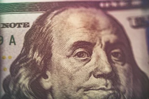 Macro close up of Ben Franklin's face on the US $100 dollar bill. 스톡 사진