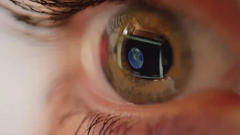 MACRO CLOSE UP: Blinking eye looking at world map and zooming image into Mexico. Stock Footage 85198843