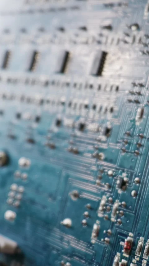 Macro Close Up of Blue Printed Circuit Board with Electronic Components Stock Footage 334114561