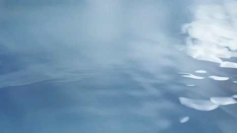 Macro Close-up of Blue Water Reflecting the Sky During the Day Video stock 219602723