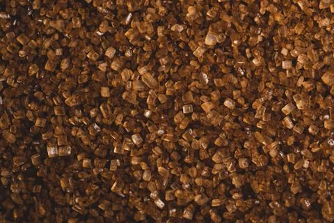 Macro close up of brown sugar, selective focus Stock Photos