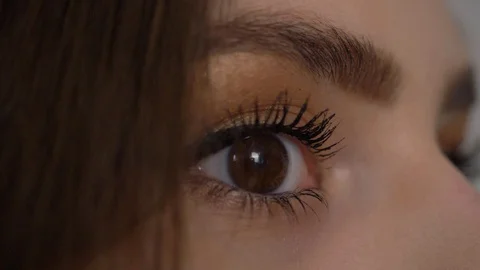 Macro close-up brown woman’s eye. Stock Footage 128762906