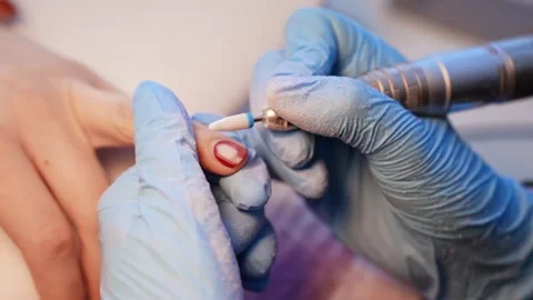 Macro close-up of a ceramic drill bit performing corrective work on a damaged Vidéo 333650941