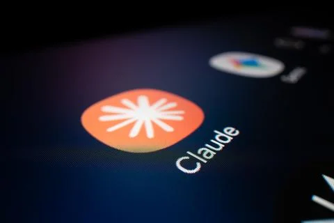 Macro close up of Claude AI app icon on smartphone screen Stock Photos