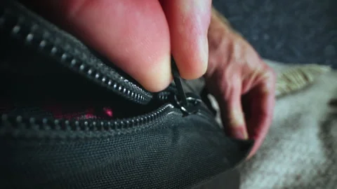 Macro Close-Up Closing Zipper on Backpack Stock Footage 328076451