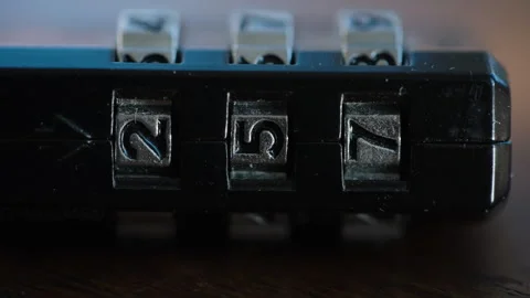 Macro Close Up Of Combination Lock Code On Table With Passing Shadows Stock Footage 328582513