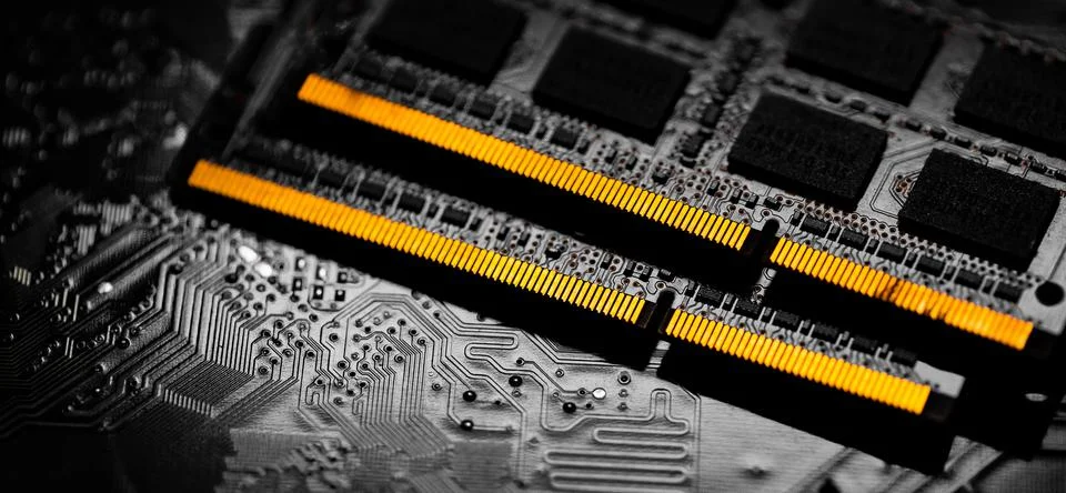 Macro Close up of computer RAM chip and motherboard. Stock Photos