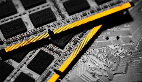 Macro Close up of computer RAM chip and motherboard. Stock Photos