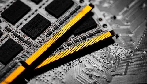 Macro Close up of computer RAM chip and motherboard. Stock Photos