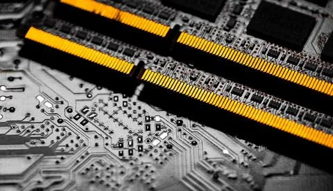 Macro Close up of computer RAM chip and motherboard. Stock Photos