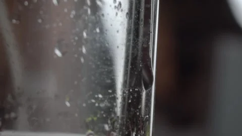 Macro Close Up Of Condensation Water Drop Moving Down Glass Surface With Stock Footage 346738571