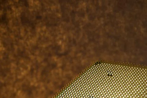 Macro close up of an CPU processor on brown background Stock-Fotos