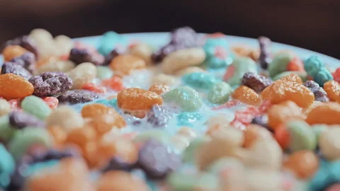 Macro Close-Up of Crispy Puffed Grain Cereal in Creamy Yogurt Stock Footage 335895251