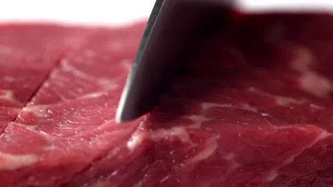Macro Close-Up of Cutting Meat with Knife Stock Footage 318409980
