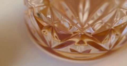 Macro Close Up of Dark Amber Whiskey Being Poured Into Glass Stock Footage 261809350