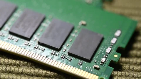 Macro Close Up of DDR4 RAM Gold Contacts with Shifting Colorful Light Stock Footage 344955522