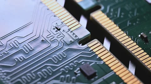 Macro Close Up of DDR4 RAM Gold Contacts with Shifting Colorful Light Stock Footage 344955635