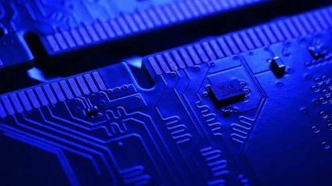 Macro Close Up of DDR4 RAM Gold Contacts with Shifting Colorful Light Stock Footage 344955709