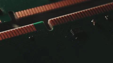 Macro Close Up of DDR4 RAM Gold Contacts with Shifting Colorful Light Stock Footage 344955779