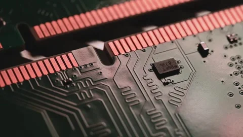 Macro Close Up of DDR4 RAM Gold Contacts with Shifting Colorful Light Stock Footage 344955784