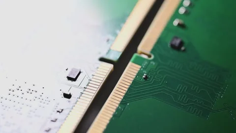 Macro Close Up of DDR4 RAM Gold Contacts with Shifting Colorful Light Stock Footage 344955887