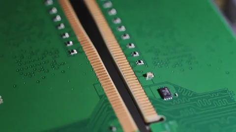 Macro Close Up of DDR4 RAM Gold Contacts with Shifting Colorful Light Stock Footage 344955908
